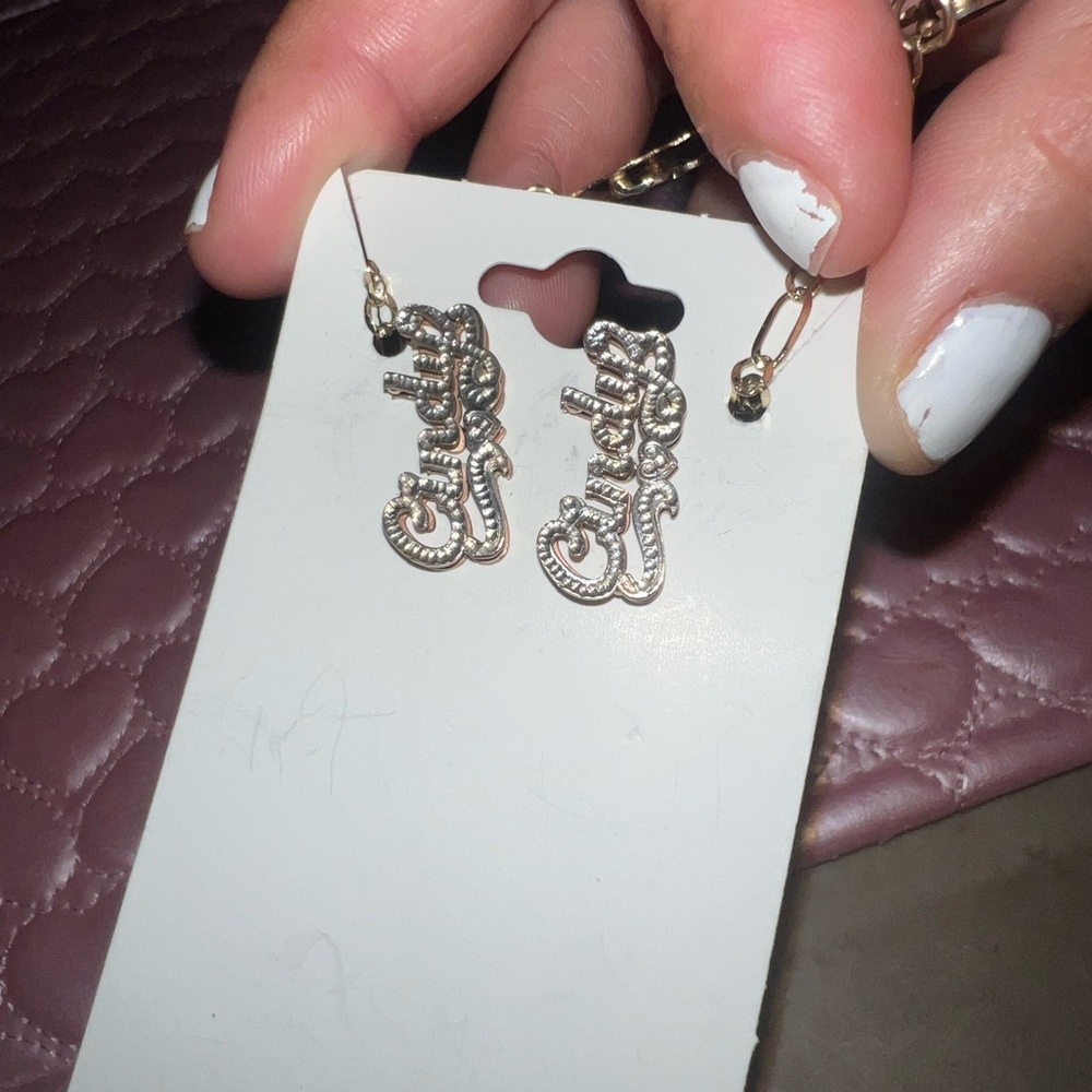 Gold Dangle Earrings with Intricate Design